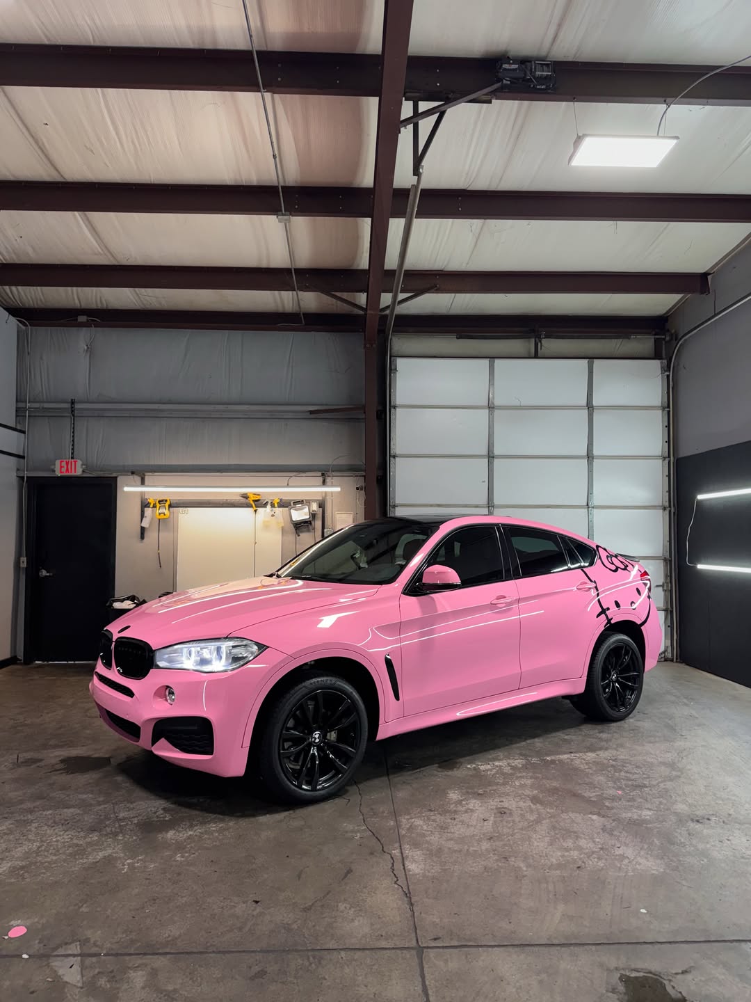 Gloss Pink Vinyl Wrap installed on BMW X6 (F16) X6 (F16)