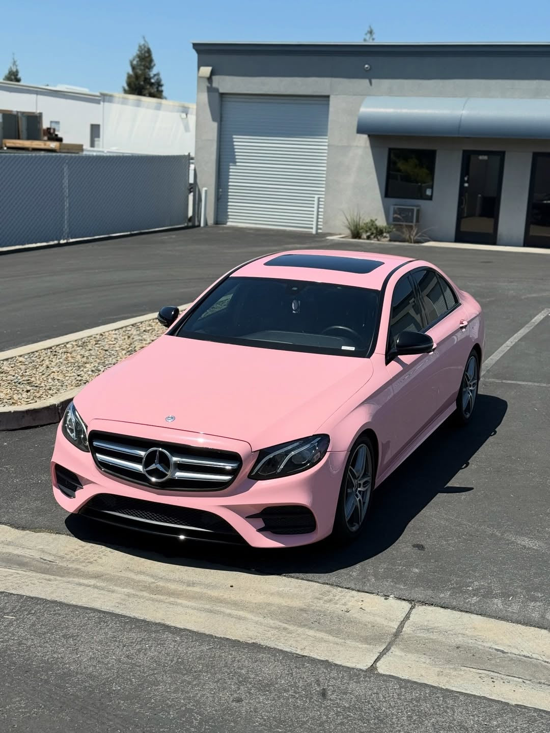 Gloss Rouge Pink Vinyl Wrap installed on Mercedes-Benz E-Class Sedan (W213) E-Class Sedan (W213)