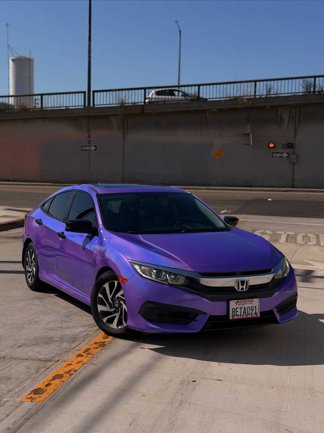 Laser Gloss Purple Vinyl Wrap installed on Honda Civic Coupe (10th generation) Civic Coupe (10th generation)
