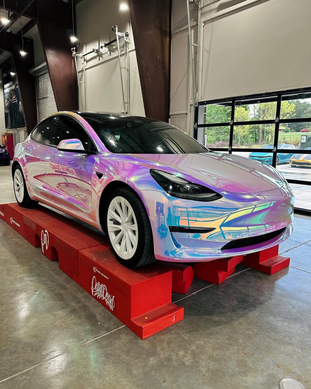 Mirror Rainbow Chrome White Vinyl Wrap installed on Tesla Model 3 Model 3