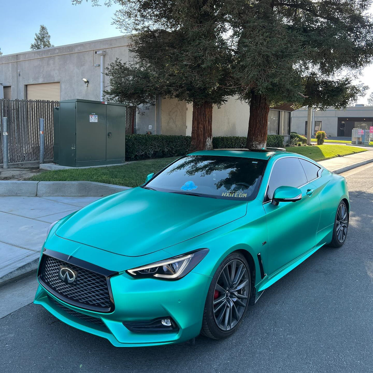Satin Chrome Emerald Green Vinyl Wrap installed on Infiniti Q60 (V37) Q60 (V37)