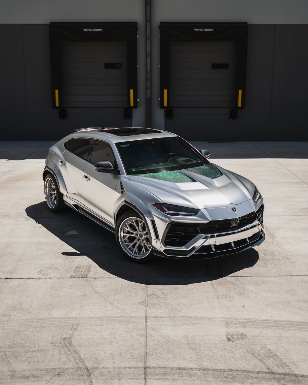 Satin Chrome Silver Vinyl Wrap installed on Lamborghini Urus Urus